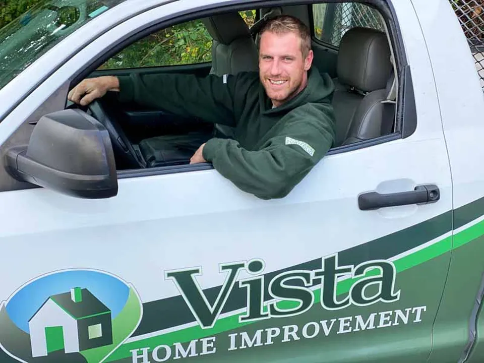 A Vista Home Improvement roofing truck arriving for an inspection